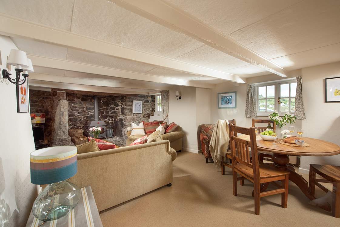 The cosy sitting-room with dining area.