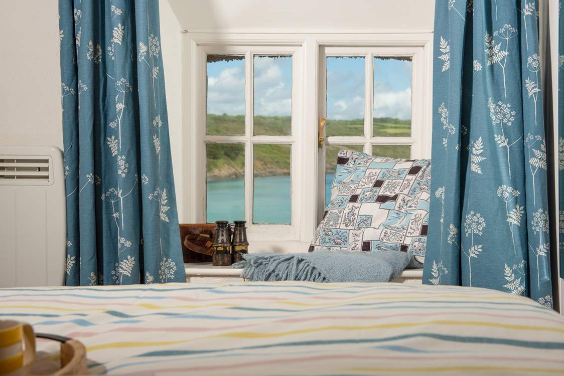 Watch the comings and goings in the bay from the window.