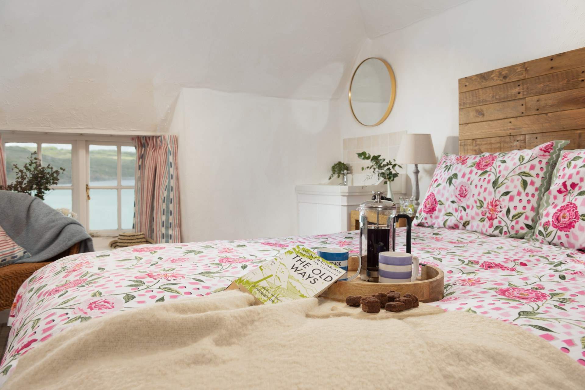 The bedrooms in this charming cottage are a delight.