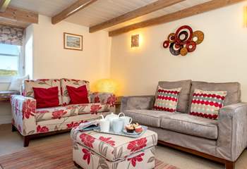 Cosy up in the sitting-room in front of the wood-burner.