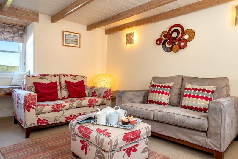 Cosy up in the sitting-room in front of the wood-burner.