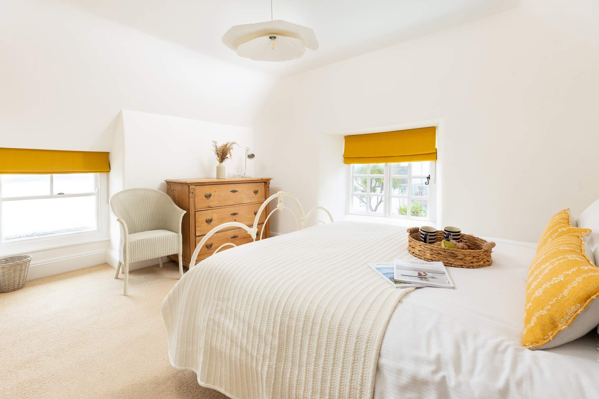 Lay in bed with your morning coffee and watch the waves roll in to the bay.