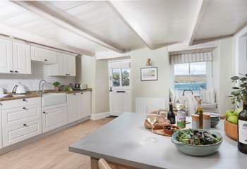 Preparing a meal in this lovely kitchen with fabulous sea views won't be a chore.
