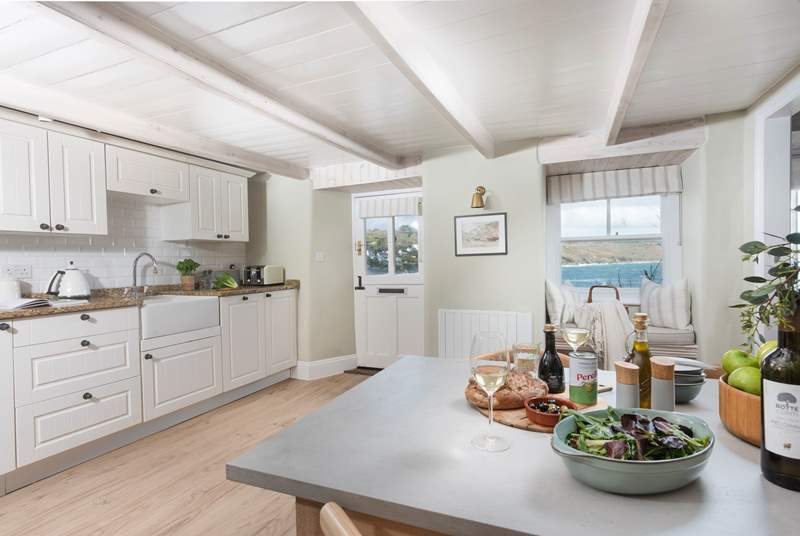 Preparing a meal in this lovely kitchen with fabulous sea views won't be a chore.