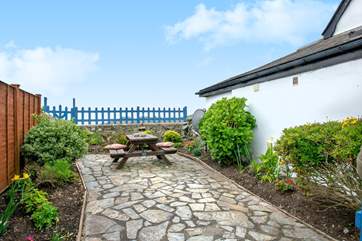 The terrace overlooks the pretty cove and beyond.
