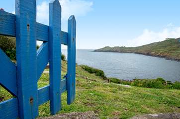 There is a gate that opens to the headland.