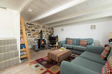 Whatever the weather, warm your toes by the wood burner.