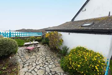 Enjoy views across the bay from the terrace.