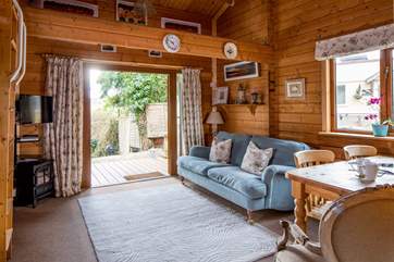 Fling open the patio doors and step out onto the decking. This fabulous set-up makes enjoying a spot of breakfast on the patio super easy.