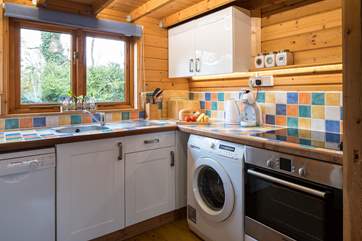 The kitchen is well-equipped and compact with everything you will need during your stay.