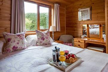 The master bedroom is comfy and inviting.