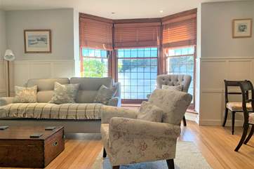 The sitting/dining room overlooks Fishbourne Green.
