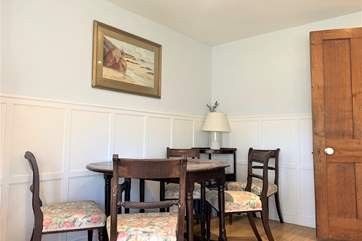 The dining table has seating for six.