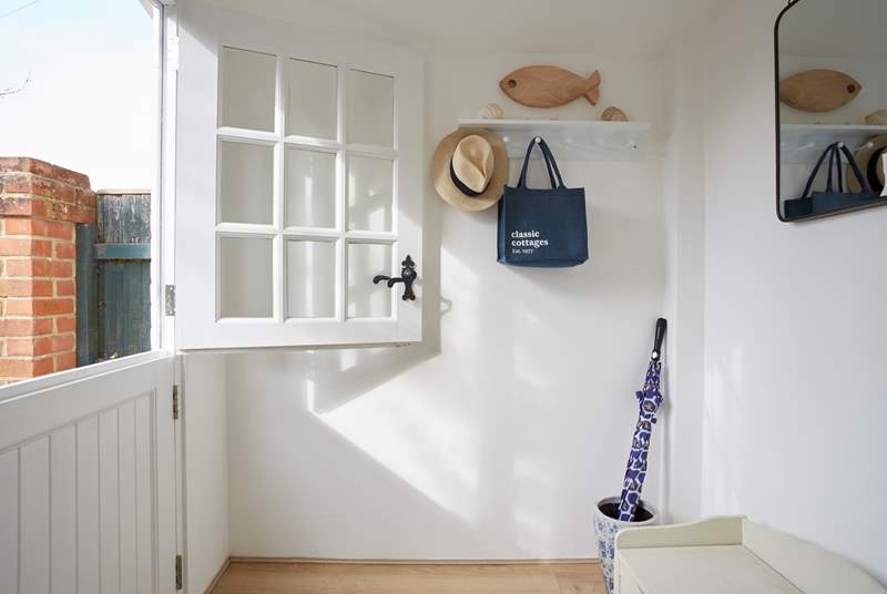 The porch entrance to the kitchen is ideal for storing your holiday essentials.