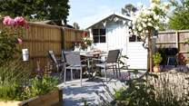 This pretty enclosed patio is a lovely spot to to dine al fresco.