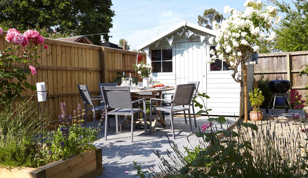This pretty enclosed patio is a lovely spot to to dine al fresco.