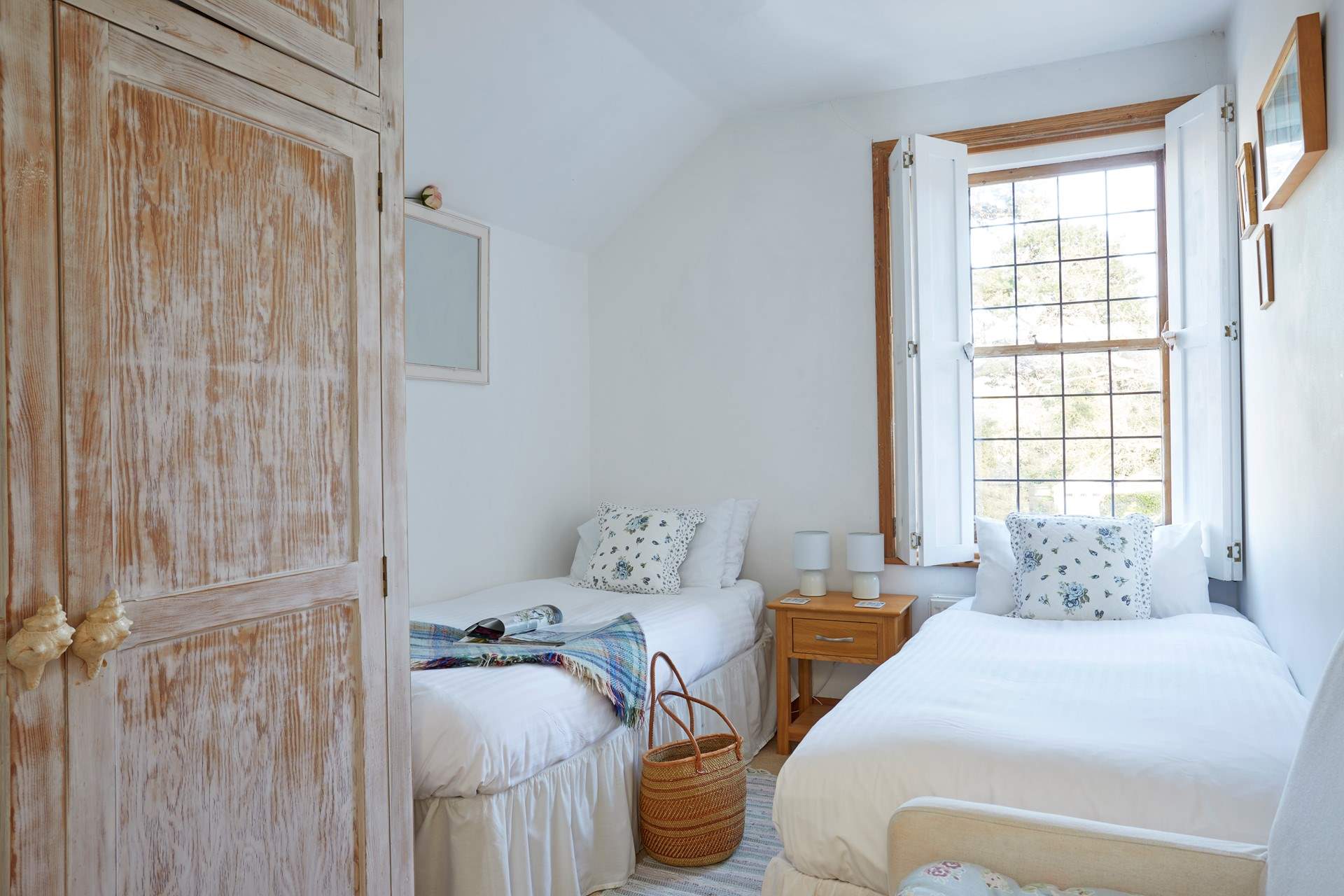 Bedroom 3 is another pretty twin bedroom with Classic Cottage charm. 