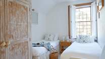 Bedroom 3 is another pretty twin bedroom with Classic Cottage charm. 