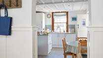 The well appointed kitchen/breakfast-room leads out to the pretty patio area.