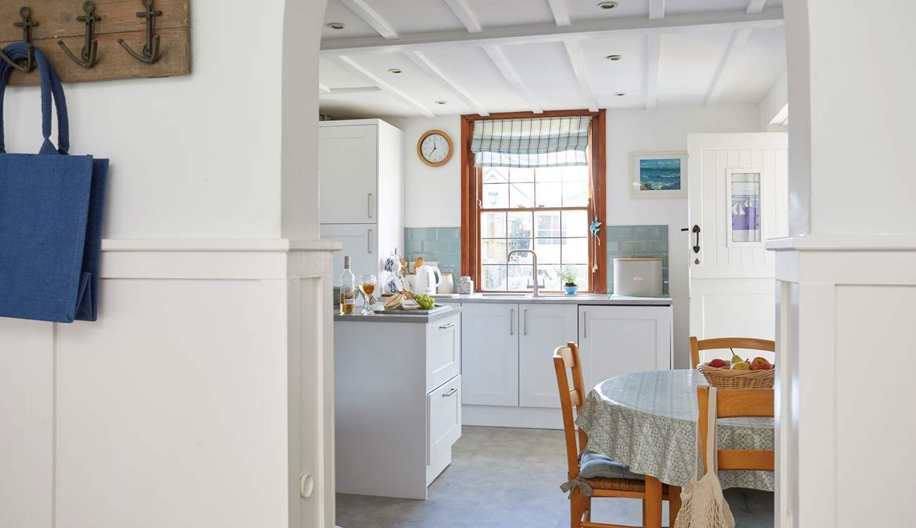 The well appointed kitchen/breakfast-room leads out to the pretty patio area.