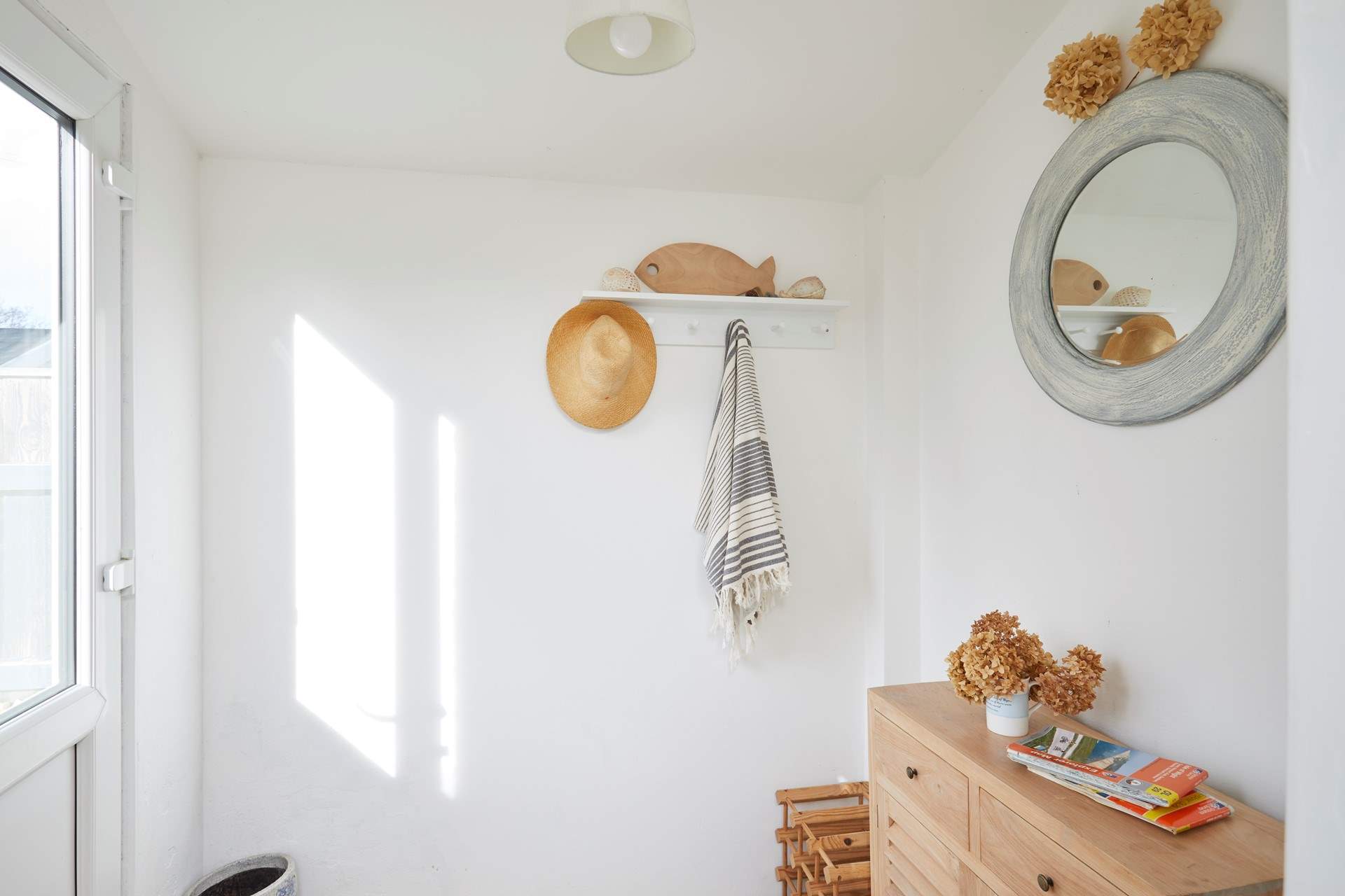 The porch entrance to the kitchen is ideal for storing your holiday essentials.