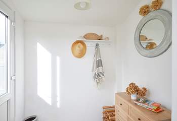 The porch entrance to the kitchen is ideal for storing your holiday essentials.