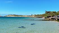 Colwell Bay is a beautiful beach on the north west coast with clear, calm waters.