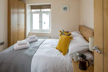 Bedroom 4 is light and airy.