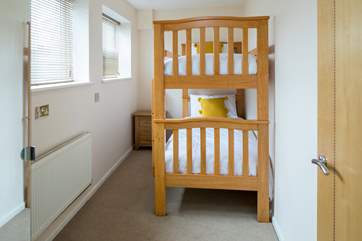 Bedroom 2 is home to these solid bunk-beds.