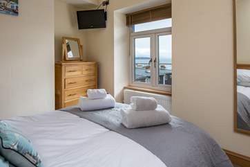 Bedroom 1 has fantastic views over the harbour. What a lovely sight to greet you in the morning.