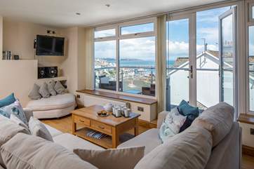 The open plan living-room is great for gathering as a family.