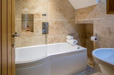 The family bathroom offers a great place to wash the sand and sun-cream off after a full day of fun.