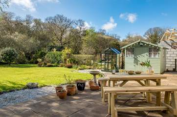 The mature garden is a real sun-trap.