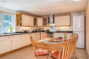 The well-equipped kitchen is the perfect place for a group meal.