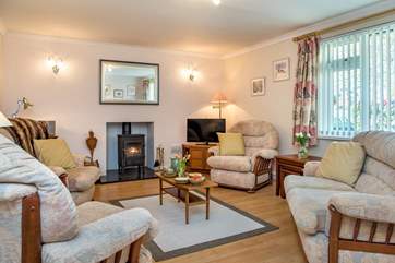 The sitting-room has plenty of space for everyone.