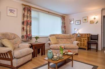 The sitting-room is lovely and light.