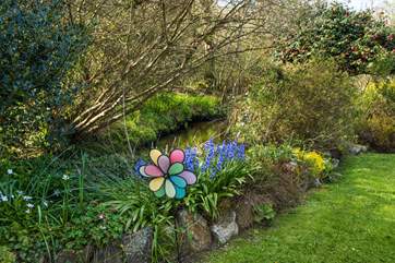 At the bottom of the garden is a fun stream to play in (please take care).