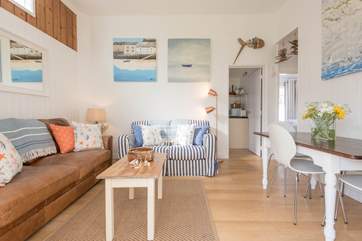 The open plan sitting/dining-room.