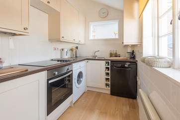 The well-equipped galley-style kitchen.