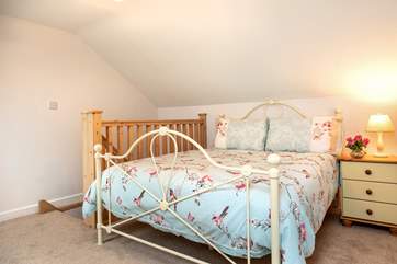 The stairs lead up into Bedroom 2 (please note there is no door to this room).