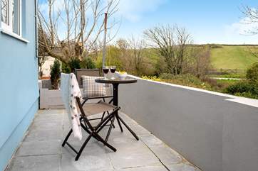 At the back is a terrace, a quiet area to sit out and relax.