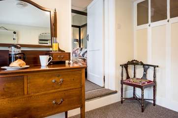 There is a step up from the dressing-room to the bedroom.