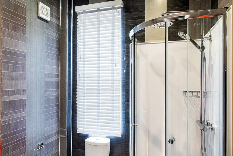 The contemporary shower-room is on the ground floor.