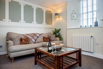 The sitting-room is a lovely room in which to unwind and relax.