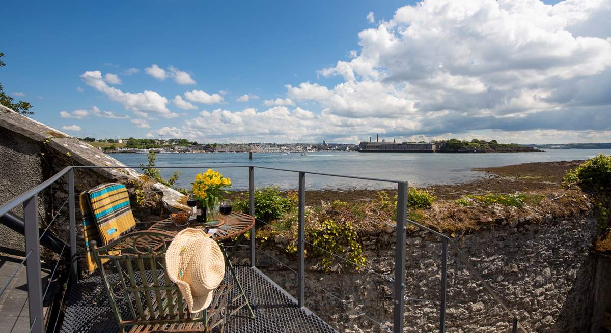 The raised terrace area is a great vantage point looking out across the water to the maritime city of Plymouth in the distance