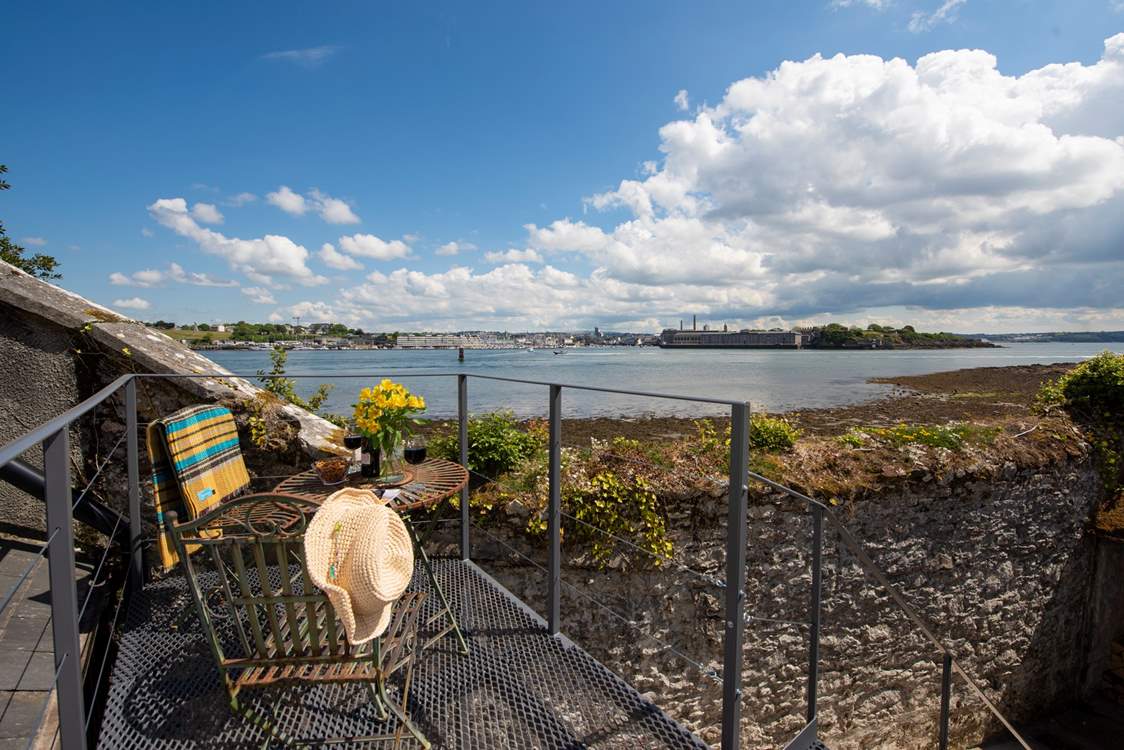 The raised terrace area is a great vantage point looking out across the water to the maritime city of Plymouth in the distance