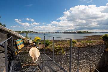 The raised terrace area is a great vantage point looking out across the water to the maritime city of Plymouth in the distance