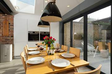 The light floods into the very contemporary space within this beautiful period house.