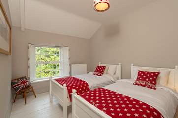 The twin bedroom is on the second floor. This room looks out to the front of the house.
