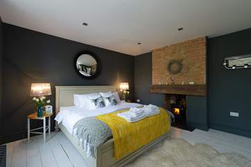 There is even a little wood burning stove in the master bedroom.